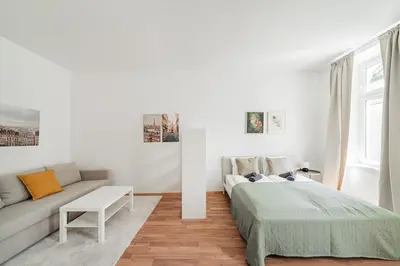 Ein Bett oder Betten in einem Zimmer der Unterkunft Central Studio Apartment