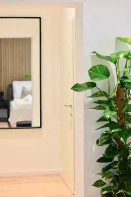 Ein Bett oder Betten in einem Zimmer der Unterkunft Urban Alley Apartment