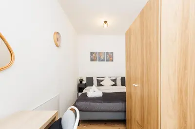 Ein Bett oder Betten in einem Zimmer der Unterkunft Mariahilfer Family boutique