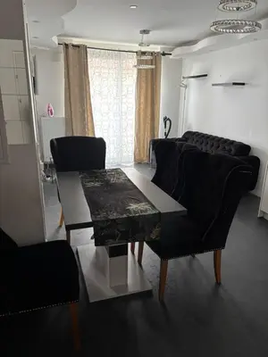 Ein Sitzbereich in der Unterkunft Isa Luxury Apartment