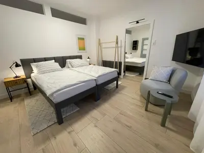 Ein Bett oder Betten in einem Zimmer der Unterkunft HausKaiser
