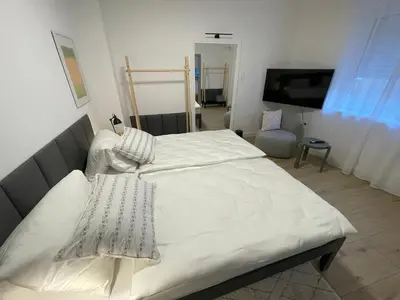 Ein Bett oder Betten in einem Zimmer der Unterkunft HausKaiser