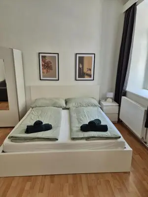 Ein Bett oder Betten in einem Zimmer der Unterkunft Cozy Stay - Schönbrunn