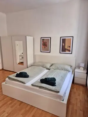 Ein Bett oder Betten in einem Zimmer der Unterkunft Cozy Stay - Schönbrunn