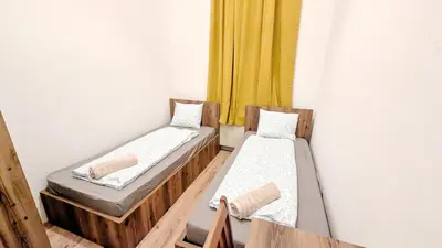 Ein Bett oder Betten in einem Zimmer der Unterkunft Spacious Rooms - 15 Min from Airport & City Center, 5 Min from Vienna Main-Bus Station EZ1