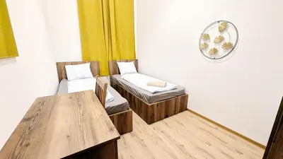 Ein Bett oder Betten in einem Zimmer der Unterkunft Spacious Rooms - 15 Min from Airport & City Center, 5 Min from Vienna Main-Bus Station EZ1