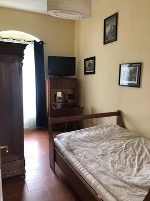Ein Bett oder Betten in einem Zimmer der Unterkunft Apartment Single in Villa