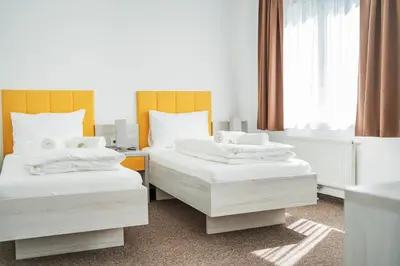 Ein Bett oder Betten in einem Zimmer der Unterkunft HOME1 - Josefstadt Apartments