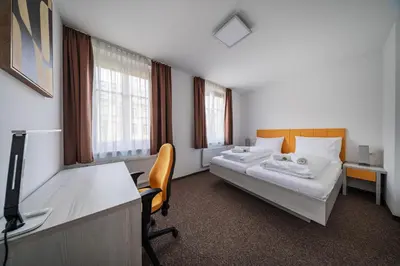 Ein Bett oder Betten in einem Zimmer der Unterkunft HOME1 - Josefstadt Apartments