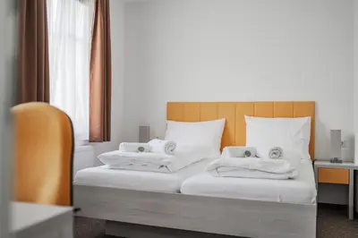 Ein Bett oder Betten in einem Zimmer der Unterkunft HOME1 - Josefstadt Apartments