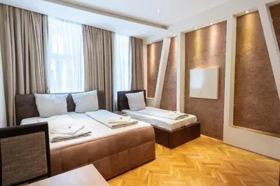 Ein Bett oder Betten in einem Zimmer der Unterkunft Vienna Living Ottakring - Aparthotel