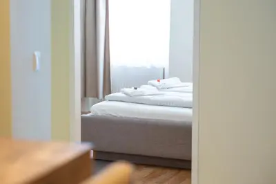 Ein Bett oder Betten in einem Zimmer der Unterkunft Vienna Living Ottakring - Aparthotel