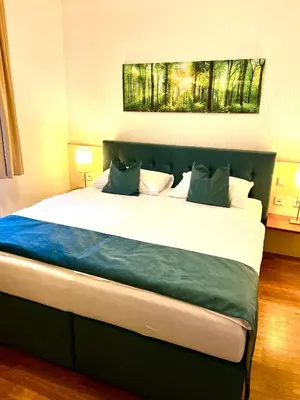 Ein Bett oder Betten in einem Zimmer der Unterkunft Home Sweet Apartments - A cozy welcome