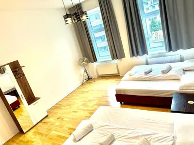 Ein Bett oder Betten in einem Zimmer der Unterkunft Laxenburger City Apartments - Only 8Min TO CITY CENTER VIENNA