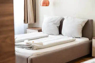 Ein Bett oder Betten in einem Zimmer der Unterkunft Vienna Business Apartments - Ottakring