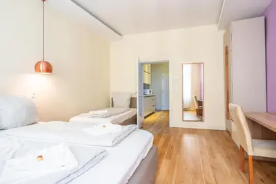Ein Bett oder Betten in einem Zimmer der Unterkunft Vienna Business Apartments - Ottakring