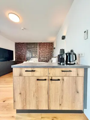 Küche/Küchenzeile in der Unterkunft Möbliertes Apartment mit Balkon