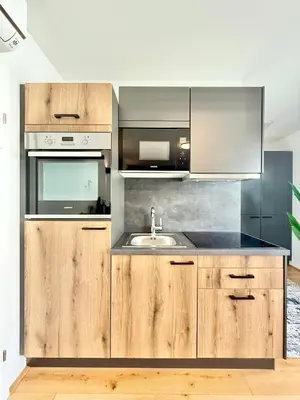 Küche/Küchenzeile in der Unterkunft Möbliertes Apartment mit Balkon