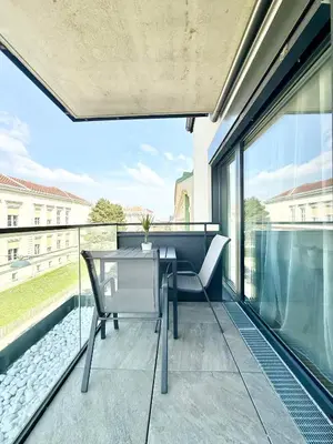 Ein Balkon oder eine Terrasse in der Unterkunft Möbliertes Apartment mit Balkon