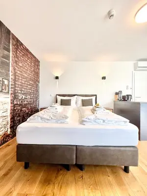 Ein Bett oder Betten in einem Zimmer der Unterkunft Möbliertes Apartment mit Balkon