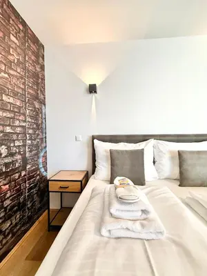 Ein Bett oder Betten in einem Zimmer der Unterkunft Möbliertes Apartment mit Balkon