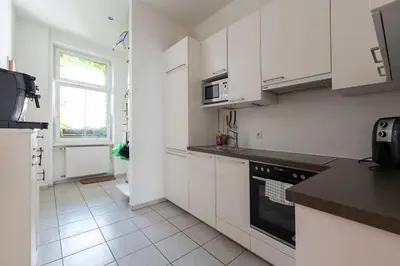 Küche/Küchenzeile in der Unterkunft Grün, ruhig und zentral, großes Apartment mit Grünblick