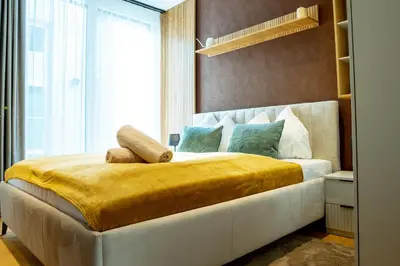 Ein Bett oder Betten in einem Zimmer der Unterkunft Luxury Penthouse with Terrace