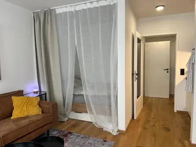 Ein Bett oder Betten in einem Zimmer der Unterkunft Kompaktes Zentrales Studio mit Parkplatz