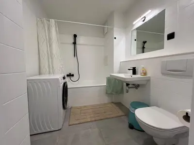 Ein Badezimmer in der Unterkunft Kompaktes Zentrales Studio mit Parkplatz