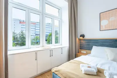Ein Bett oder Betten in einem Zimmer der Unterkunft josef's home I Premium Studio I Metro Access