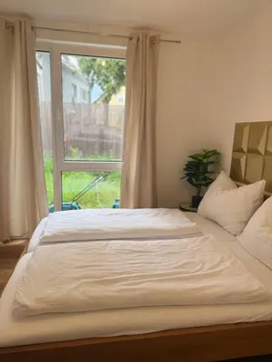 Ein Bett oder Betten in einem Zimmer der Unterkunft Cozy 2BR Apartment In Floridsdorf Area