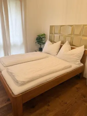 Ein Bett oder Betten in einem Zimmer der Unterkunft Cozy 2BR Apartment In Floridsdorf Area