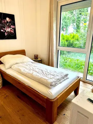 Ein Bett oder Betten in einem Zimmer der Unterkunft Cozy 2BR Apartment In Floridsdorf Area