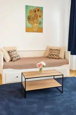 Ein Sitzbereich in der Unterkunft Royalty Zimmer