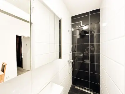 Ein Badezimmer in der Unterkunft Cozy Rooms in Brigittenau Area MM7