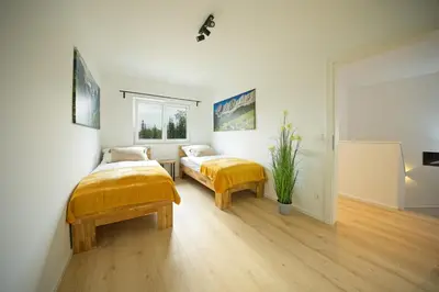 Ein Bett oder Betten in einem Zimmer der Unterkunft VARIO-HAUS Residence