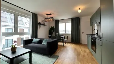 Ein Sitzbereich in der Unterkunft Moderne OG Wohnung inklusive Dachterrasse