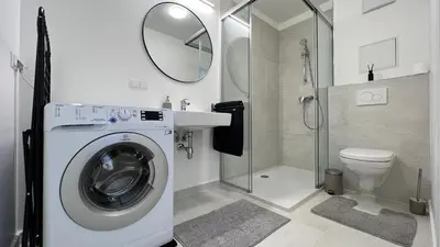 Ein Badezimmer in der Unterkunft Moderne OG Wohnung inklusive Dachterrasse