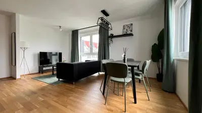 Ein Sitzbereich in der Unterkunft Moderne OG Wohnung inklusive Dachterrasse