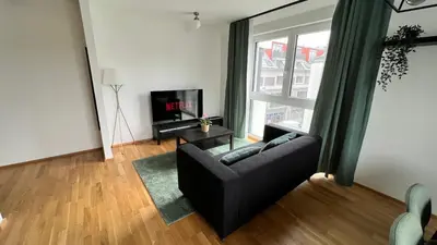 TV/Unterhaltungsangebot in der Unterkunft Moderne OG Wohnung inklusive Dachterrasse