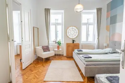 Ein Bett oder Betten in einem Zimmer der Unterkunft Prestige Living Vienna
