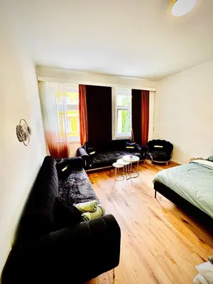 Ein Bett oder Betten in einem Zimmer der Unterkunft Cozy Apartment in Märzstraße Area MZ37