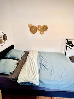 Ein Bett oder Betten in einem Zimmer der Unterkunft Cozy Apartment in Märzstraße Area MZ37