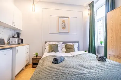 Ein Bett oder Betten in einem Zimmer der Unterkunft Comfy & Quiet Studio in Viennas 12th District