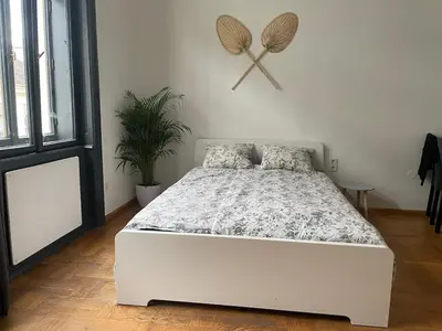 Ein Bett oder Betten in einem Zimmer der Unterkunft Stylish Flat in Heart of Vienna