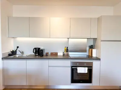 Küche/Küchenzeile in der Unterkunft Cozy & Modern 2 BR Apartment in peaceful Area