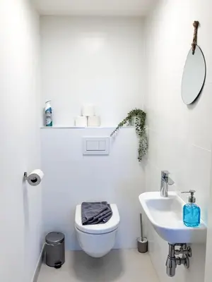 Ein Badezimmer in der Unterkunft Cozy & Modern 2 BR Apartment in peaceful Area