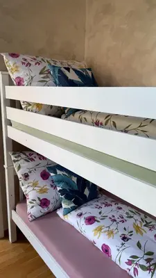 Ein Bett oder Betten in einem Zimmer der Unterkunft Sunshine