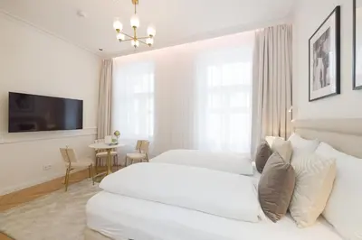 Ein Bett oder Betten in einem Zimmer der Unterkunft RAFAEL KAISER - Signature Apartments City Centre