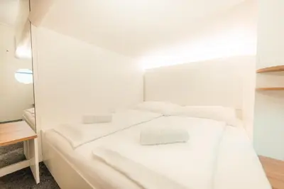 Ein Bett oder Betten in einem Zimmer der Unterkunft Grand Pods - Stylish Sleeping Concept